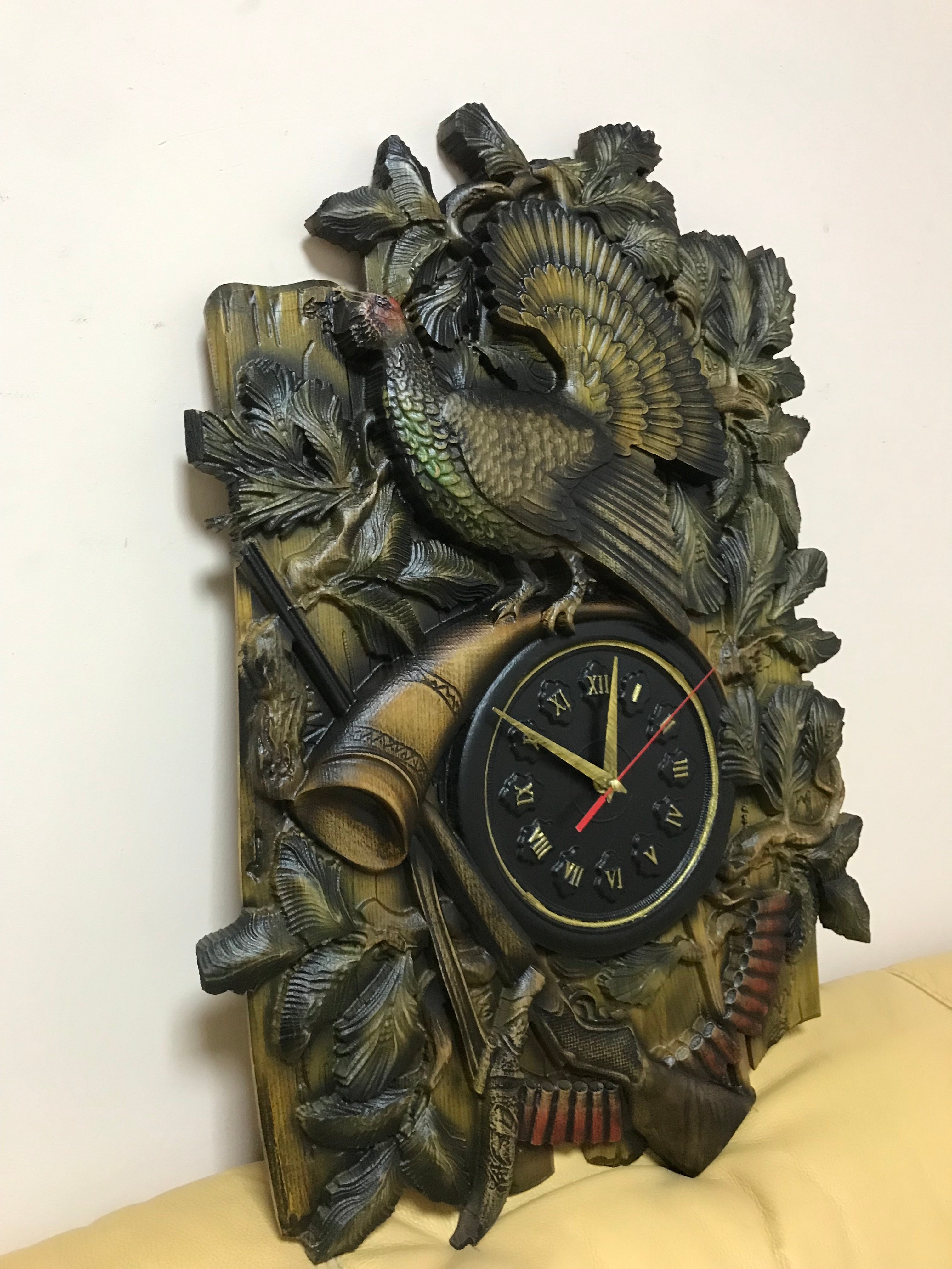 Carved ash wood wall clock with capercaillie bird shown at angle, rustic hunting wall decor