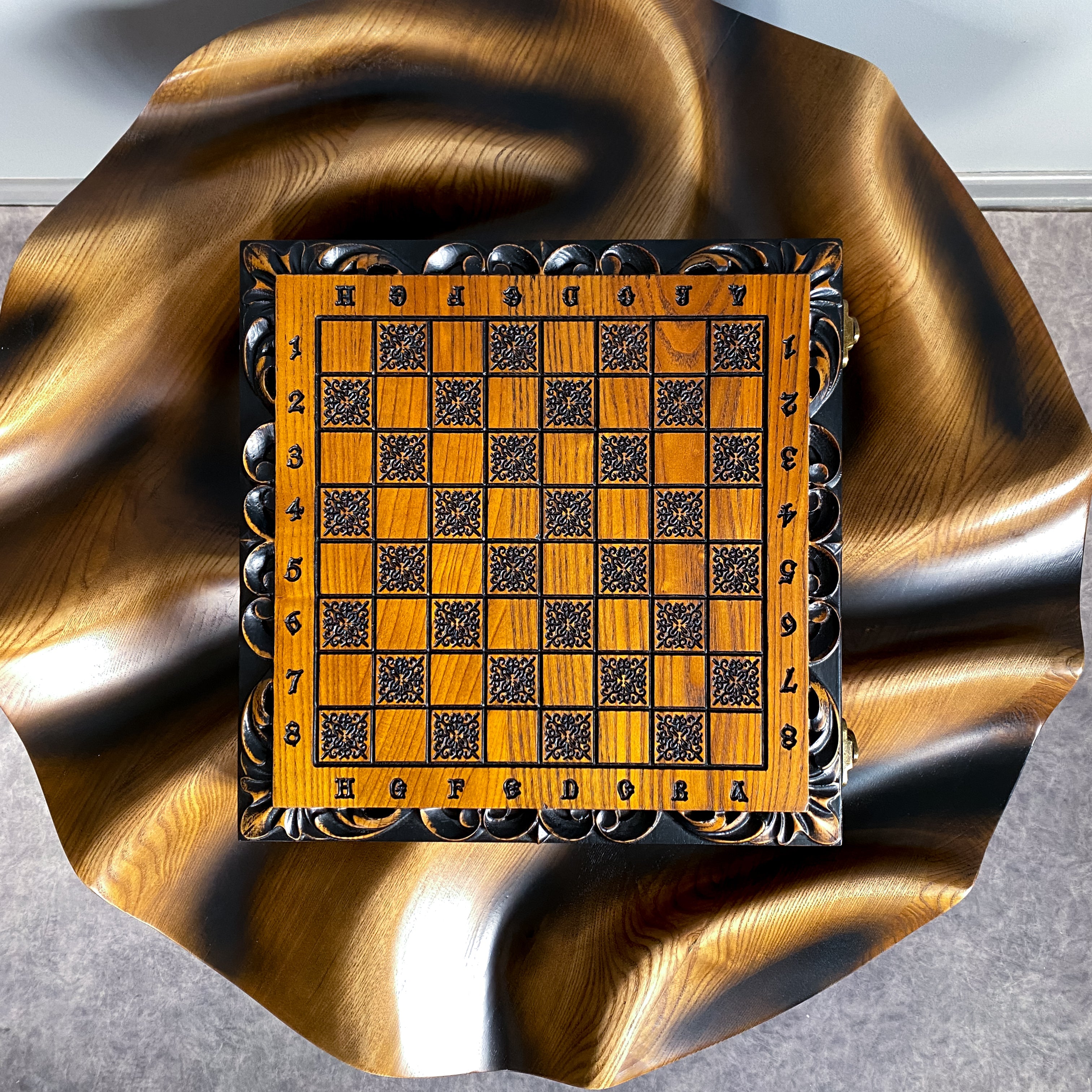 Handcrafted wooden chess and checkers set with carved bear design, ash wood board