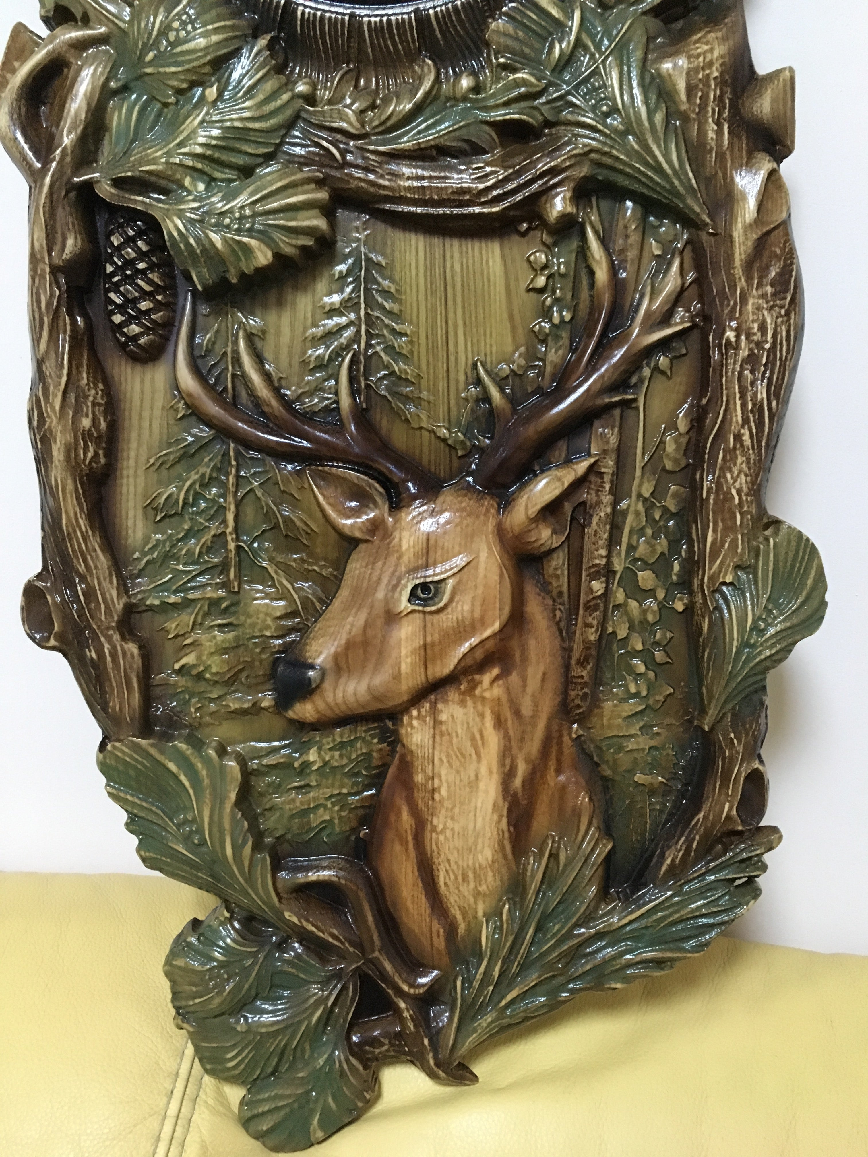 Carved wooden wall clock featuring deer head, wildlife hunting wall decor