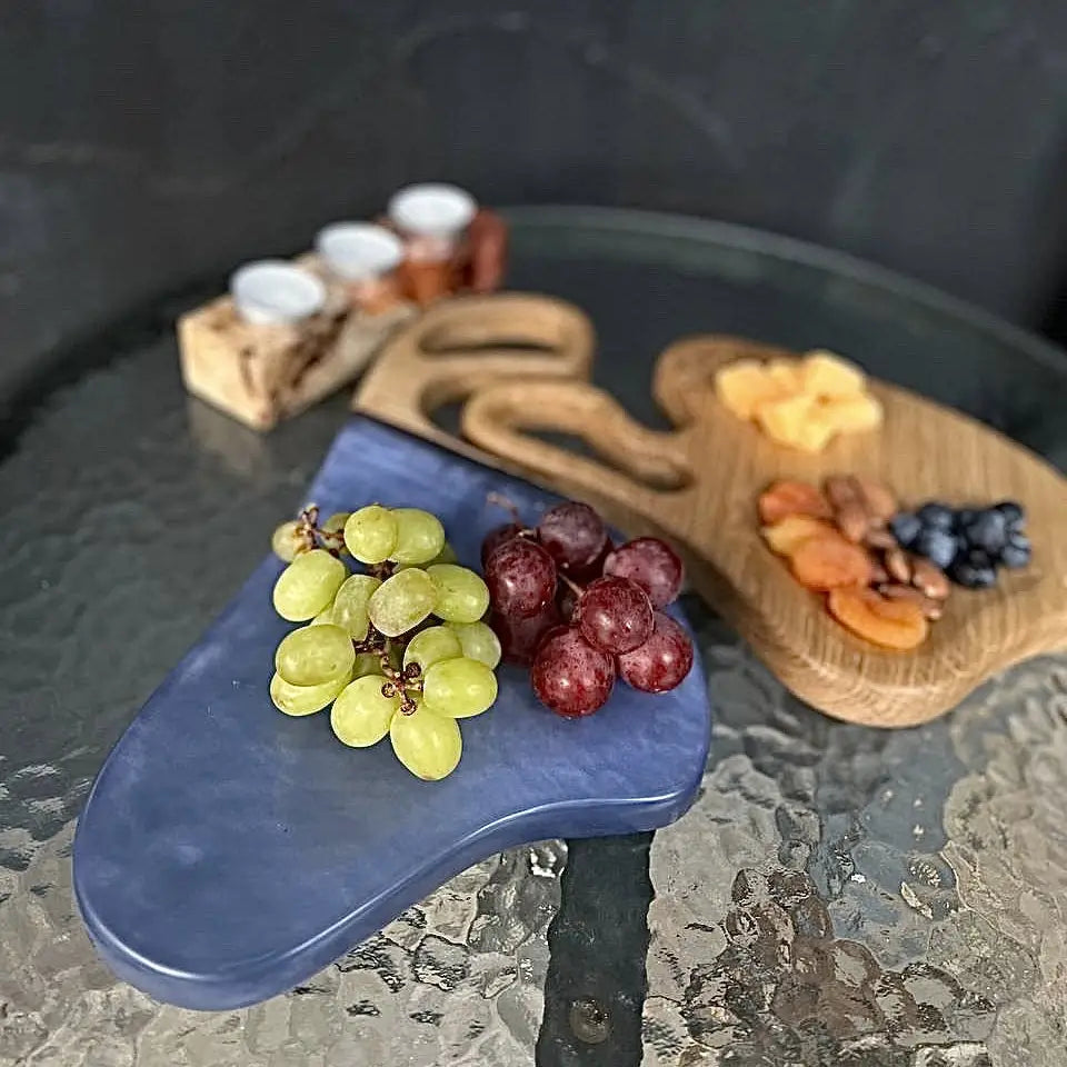 Wooden serving board set made from natural wood and blue epoxy resin