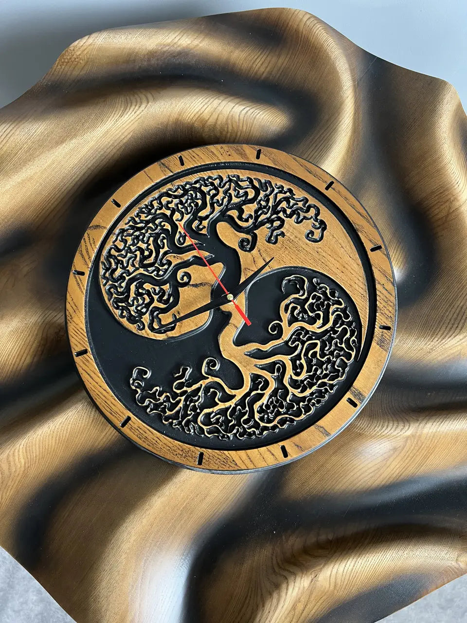 Hand carved ash wood wall clock with Tree of Life design and black background