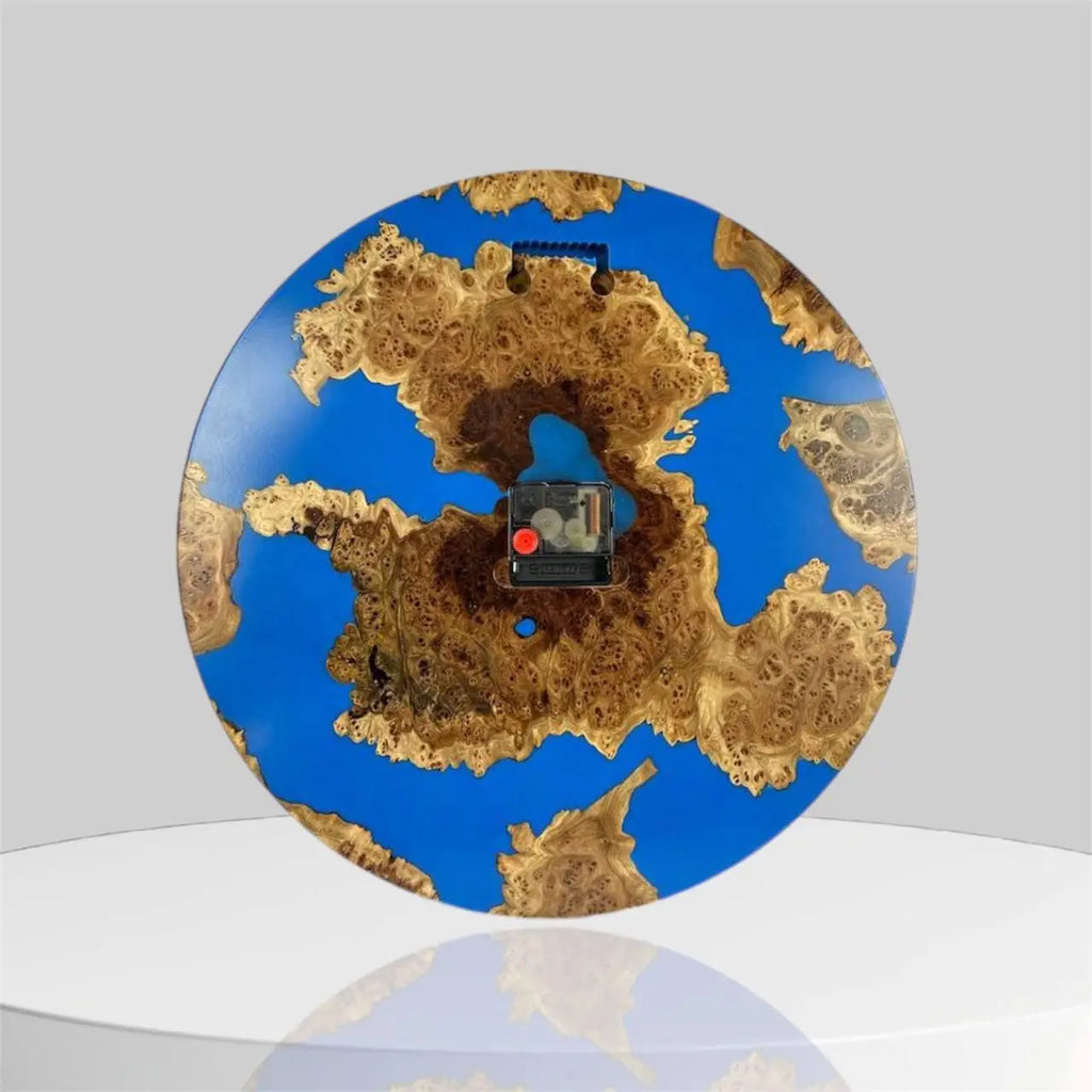 Burl wood wall clock crafted with vibrant blue resin