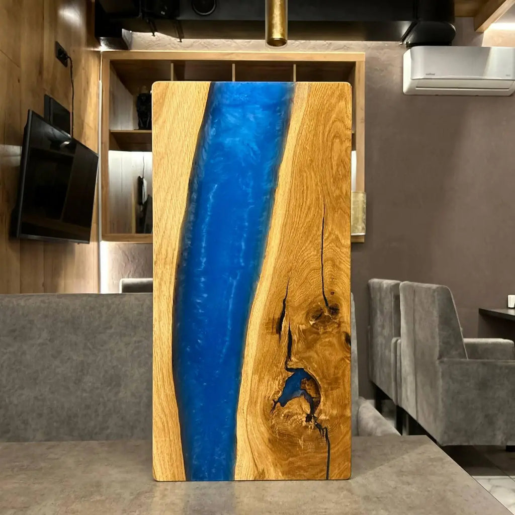 Artisan wooden backgammon board with vivid blue epoxy river