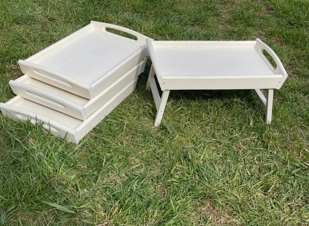 Minimalist white wooden tray used as bed table