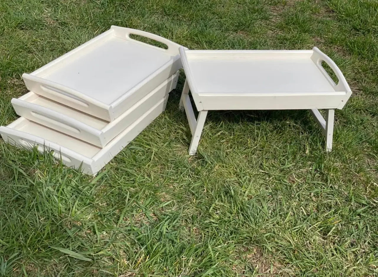 Minimalist white wooden tray used as bed table
