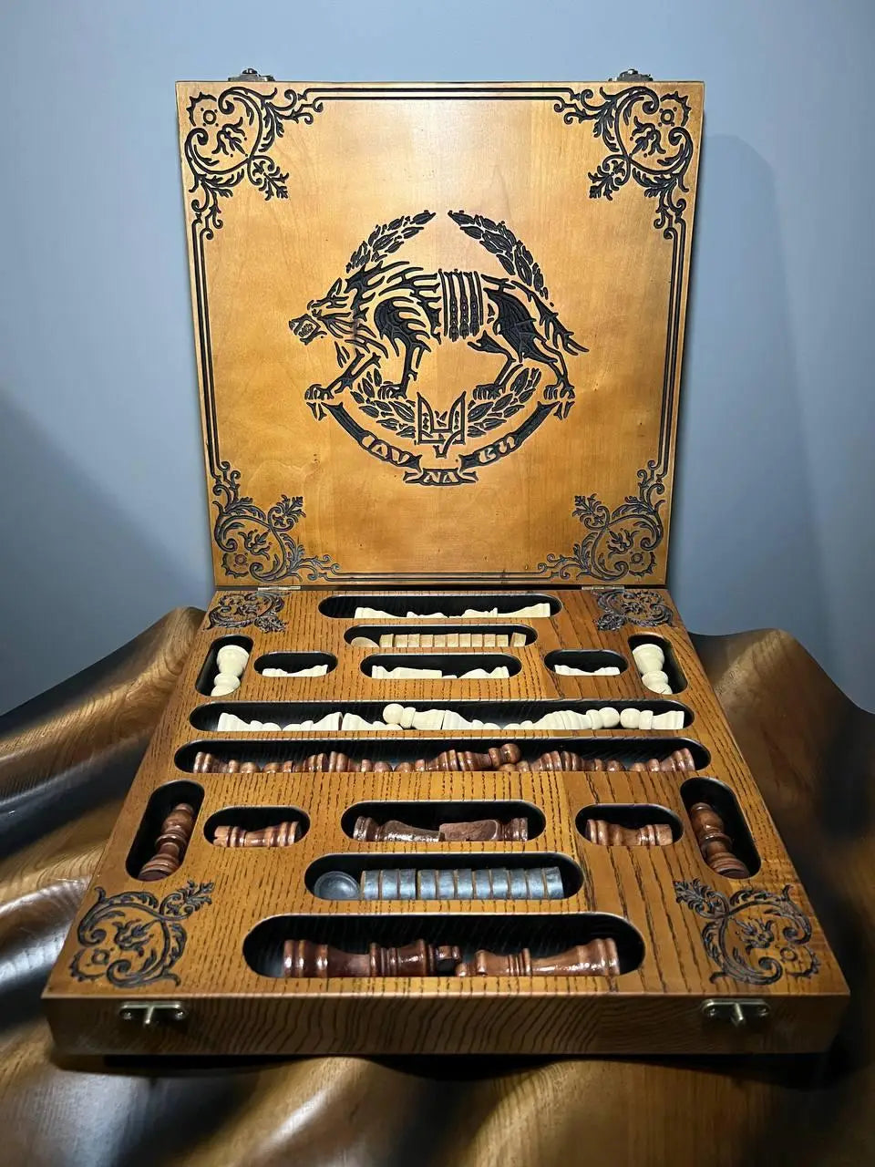 Ash wood chessboard with detailed carving and classic board layout