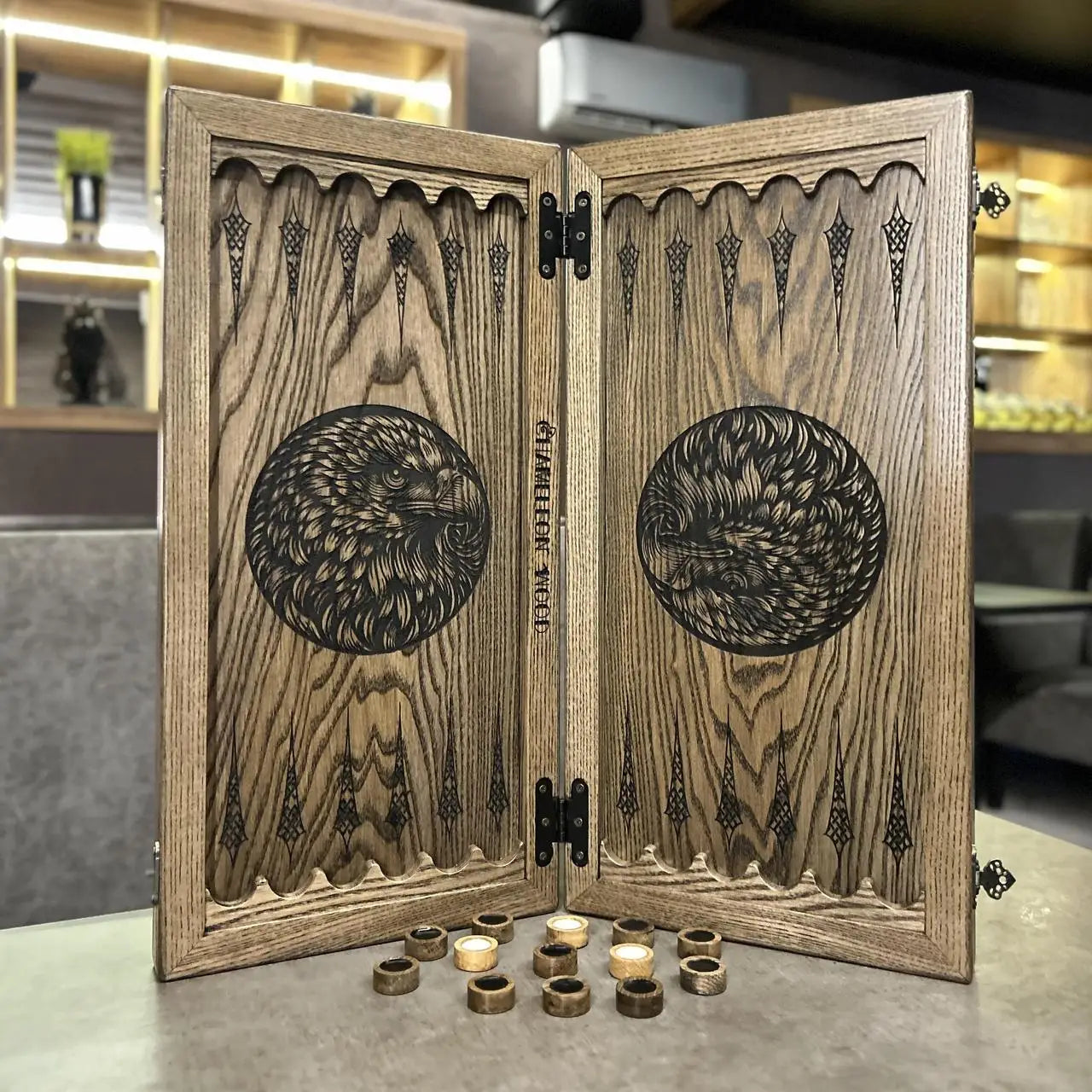 Eagle artwork on handmade ash wood backgammon playing surface