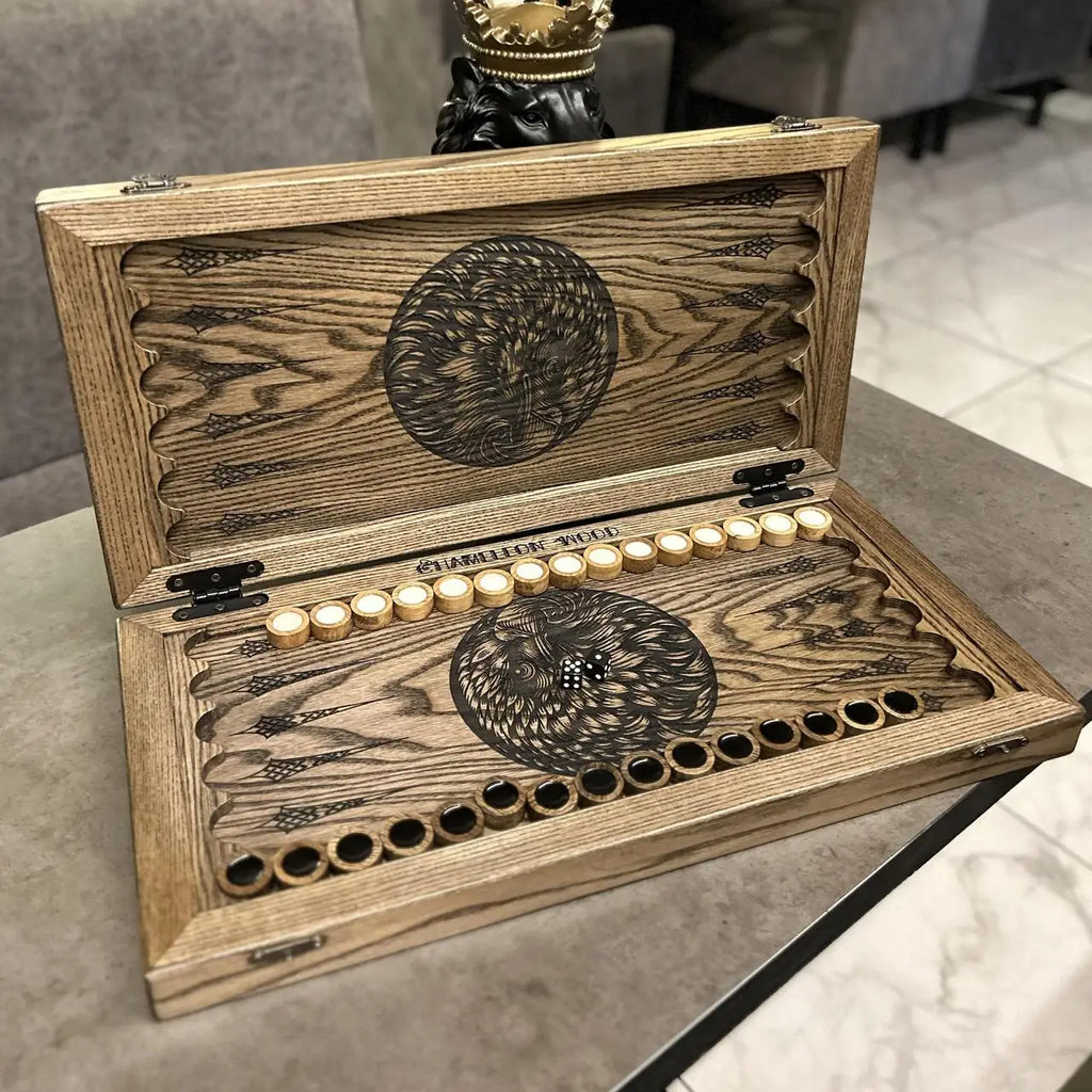 Wooden playing pieces inside handmade Eagle backgammon set