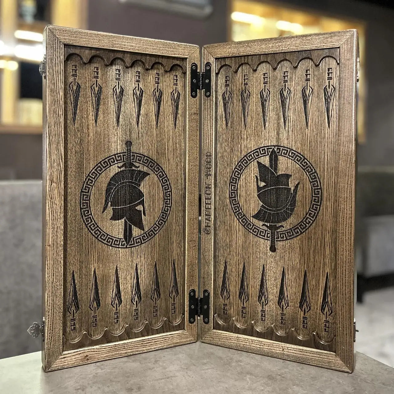 Wooden checkers and playing surface of Spartan backgammon set