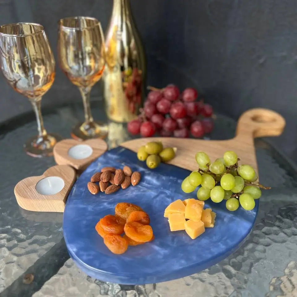 Luxury charcuterie board with ergonomic handle for serving cheese, fruit and appetizers