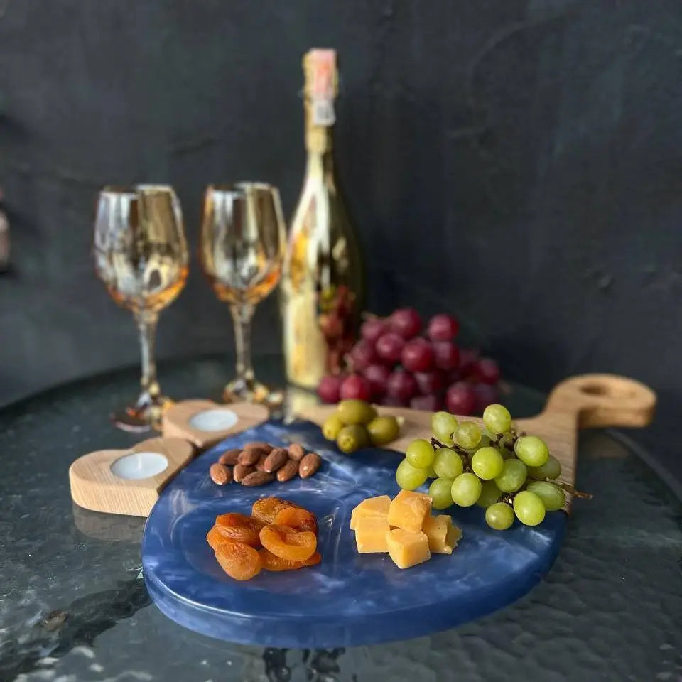Wooden cheese platter crafted from solid oak with decorative blue epoxy resin finish