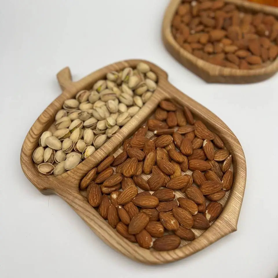 Wooden acorn snack tray with divided compartments for serving appetizers