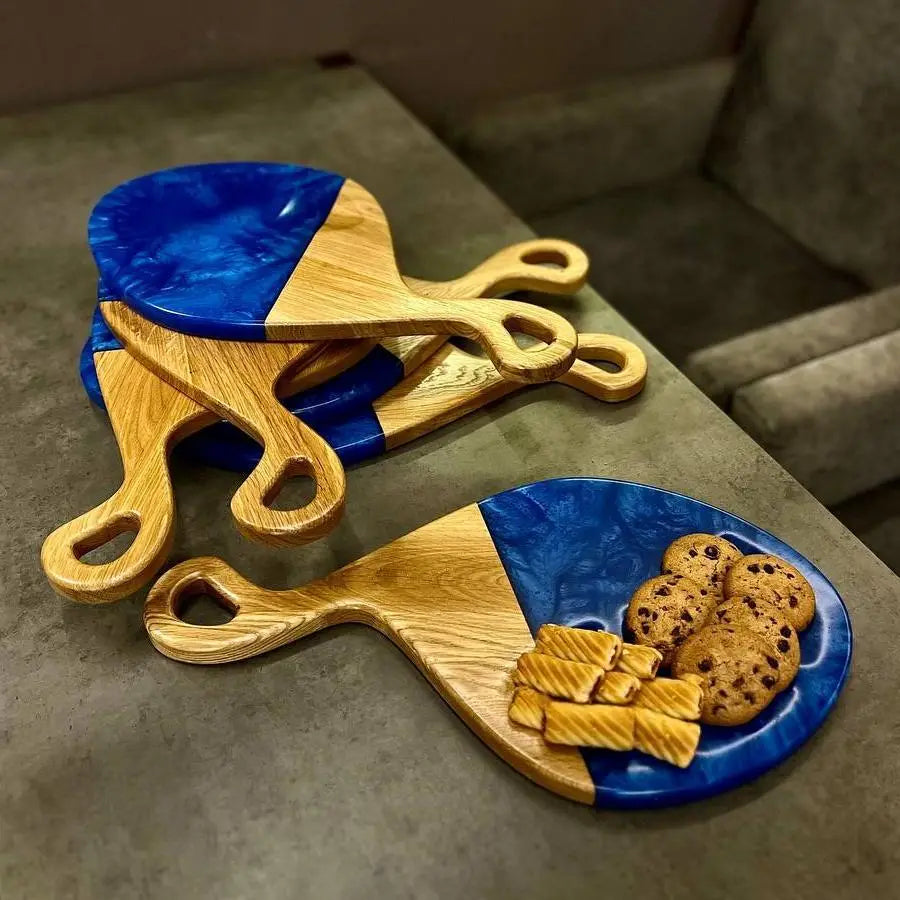 Premium handmade wooden serving board with epoxy resin for elegant food presentation