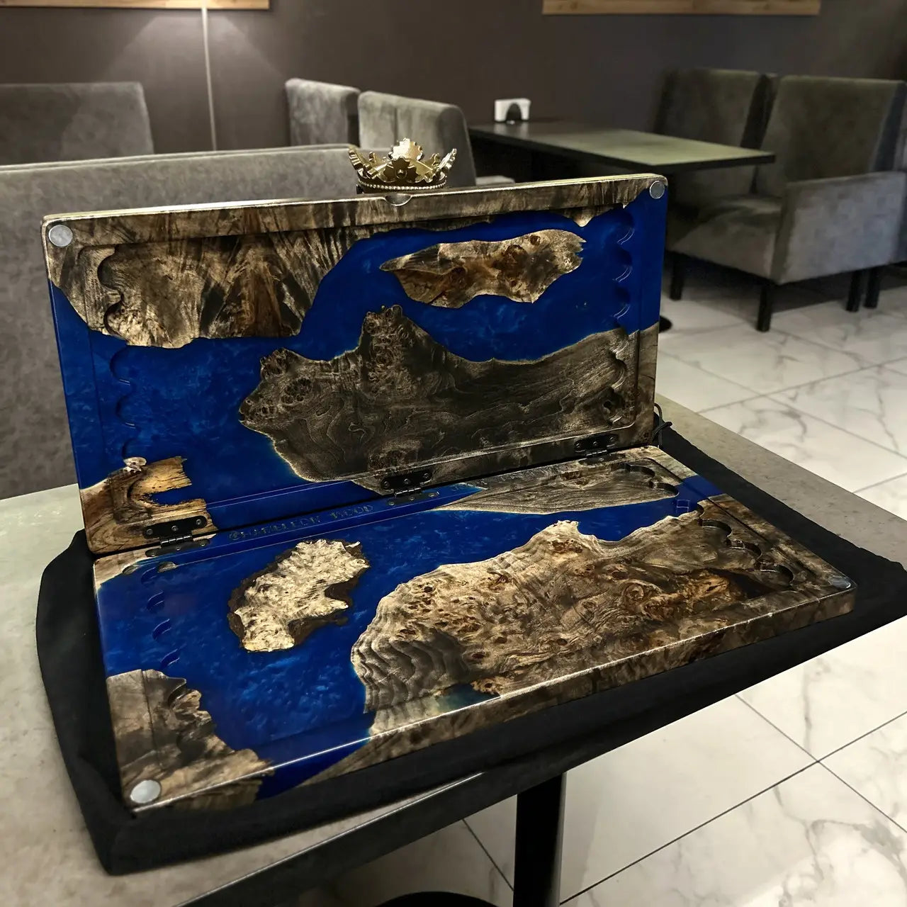 Closed luxury wooden backgammon board with cobalt blue epoxy resin