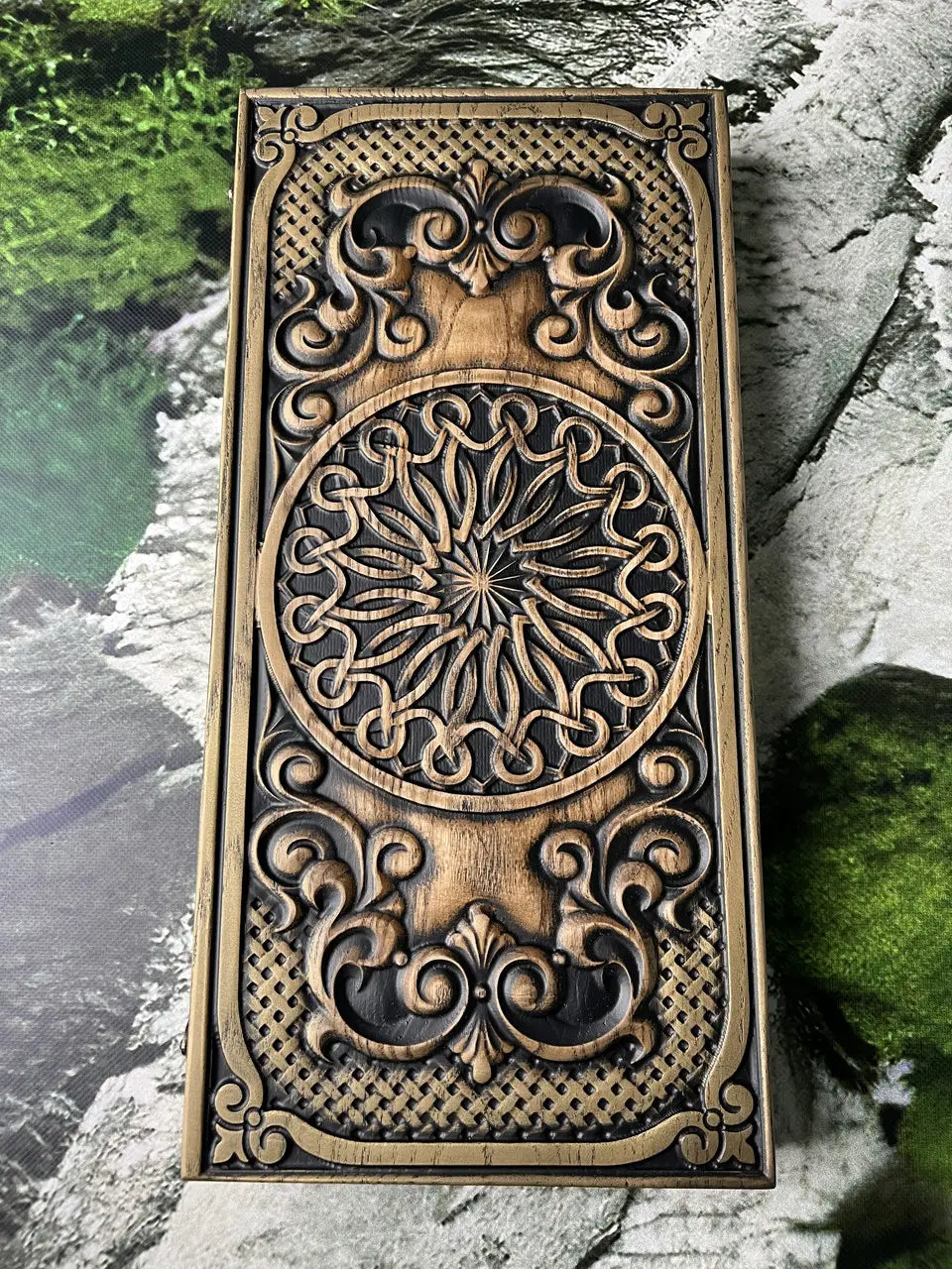 Close-up of handcrafted backgammon board with Ukrainian ornament