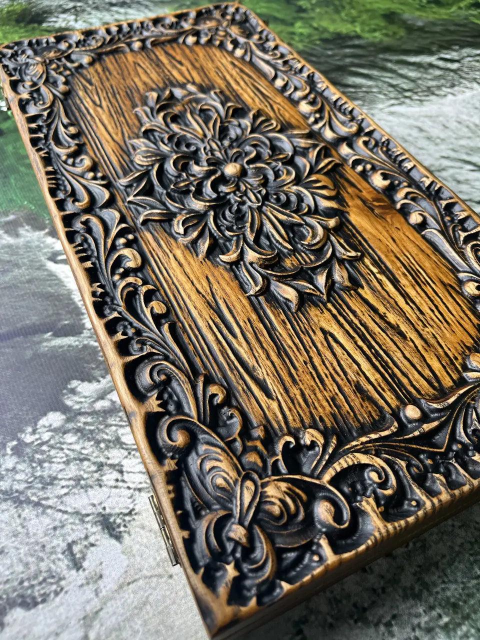 Close-up of luxury wooden backgammon board with resin checkers and dice