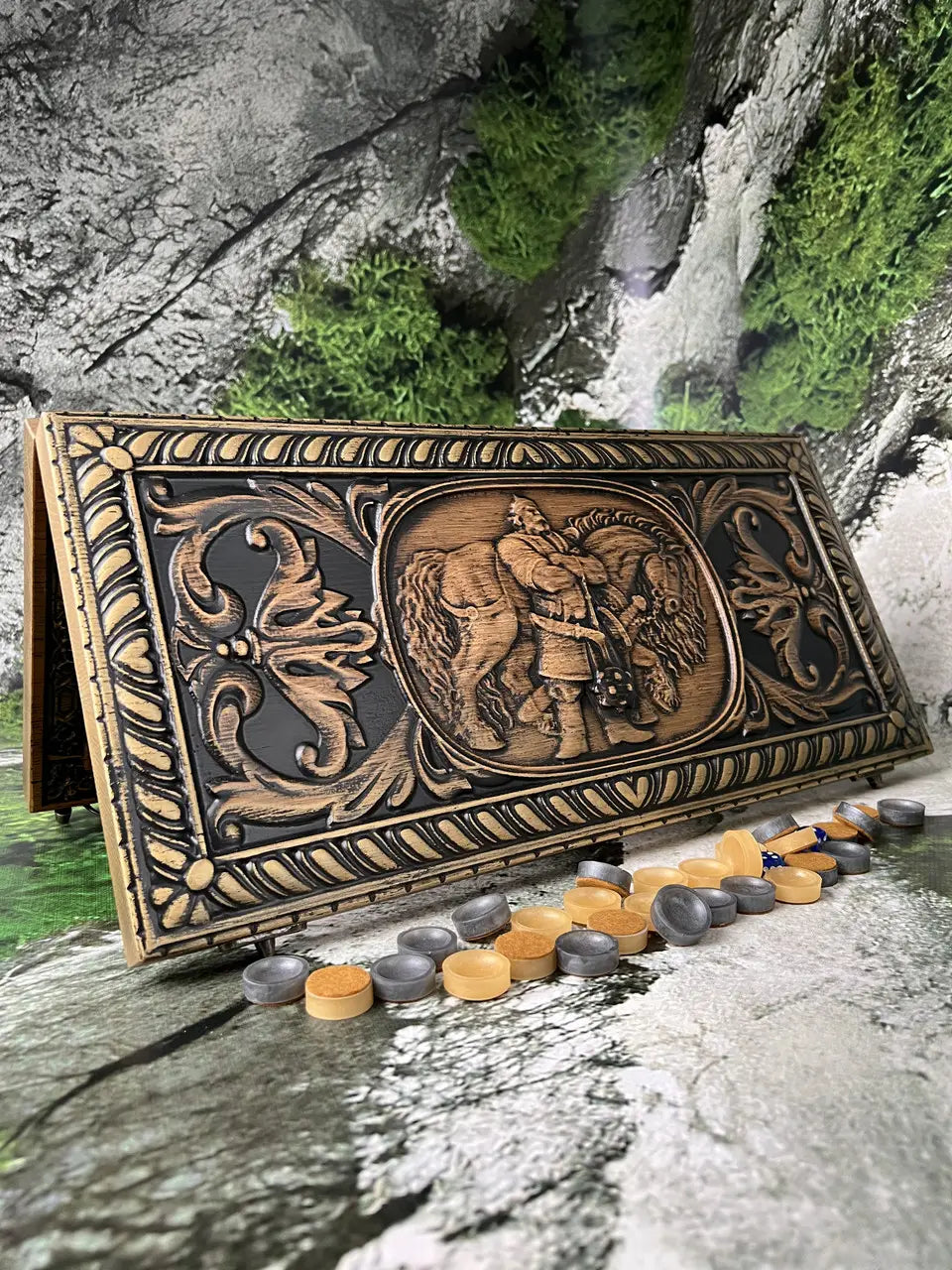 Open carved backgammon board with decorative playing field