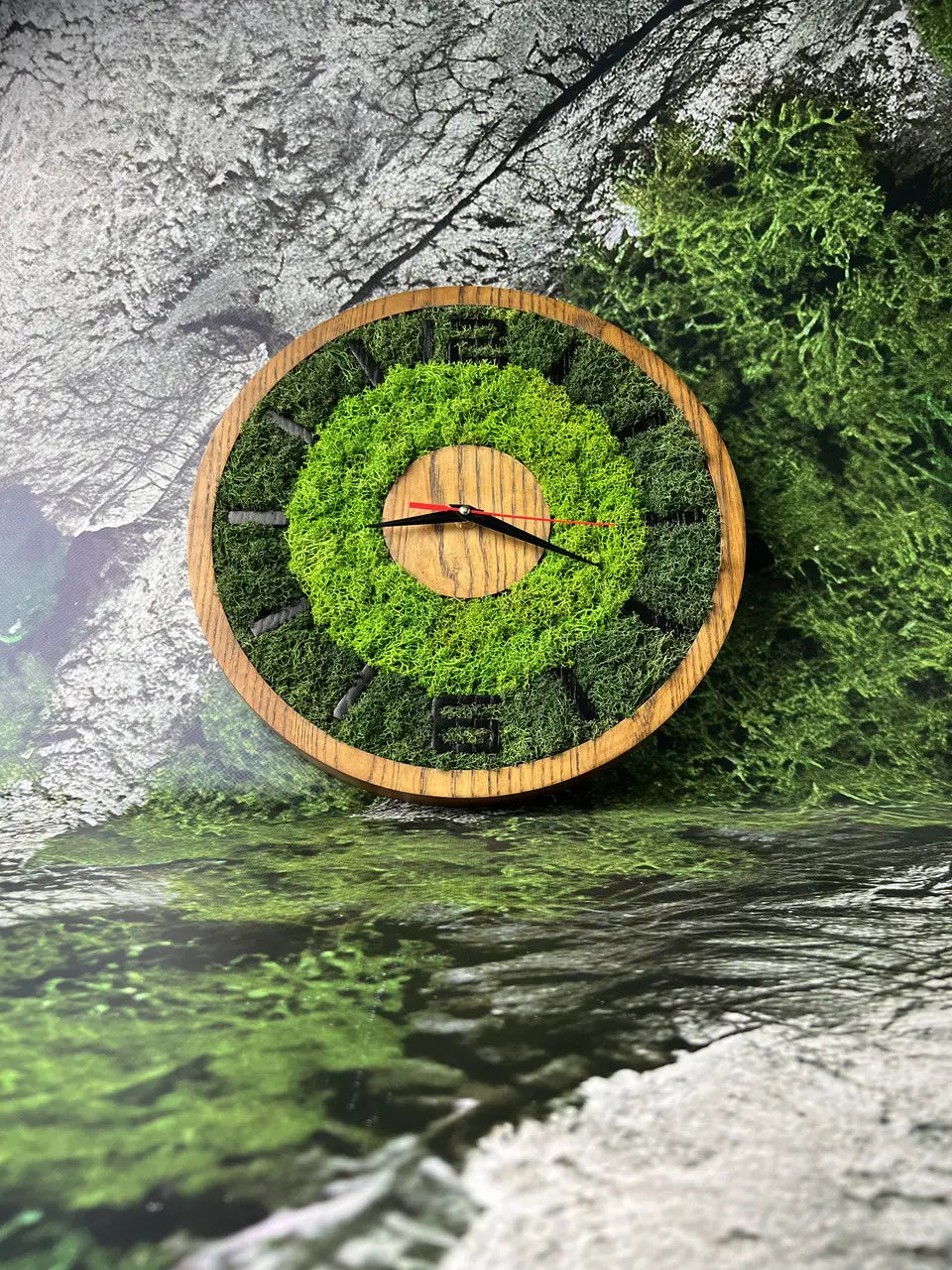 Wooden wall clock with green stabilized moss detail