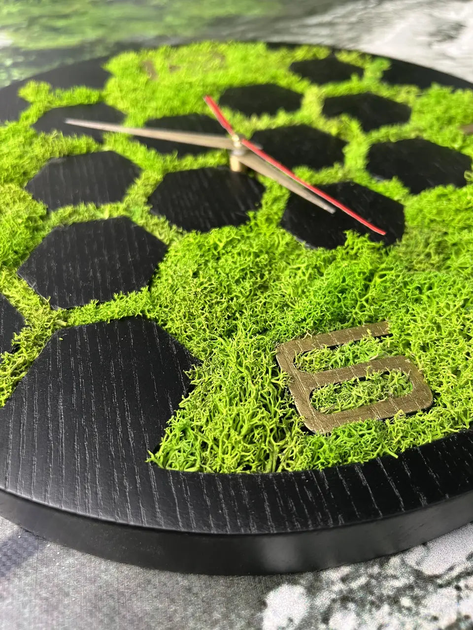 Geometric wooden wall clock with preserved green moss