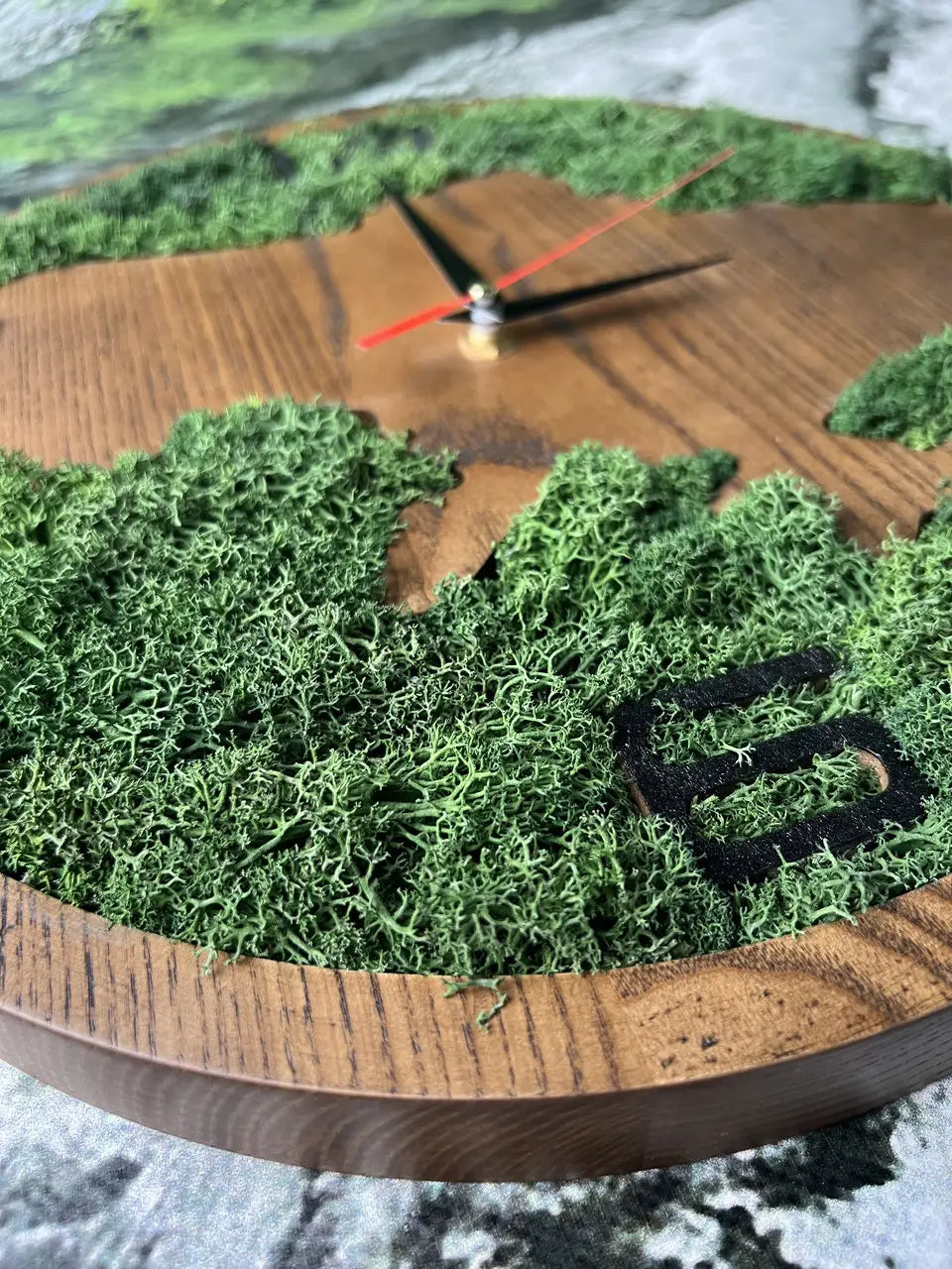 Rustic wooden wall clock with organic moss design