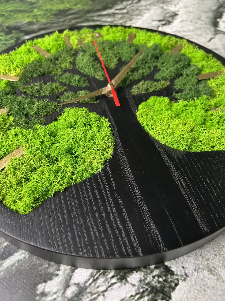 Round Wooden Wall Clock with dark wood and green moss
