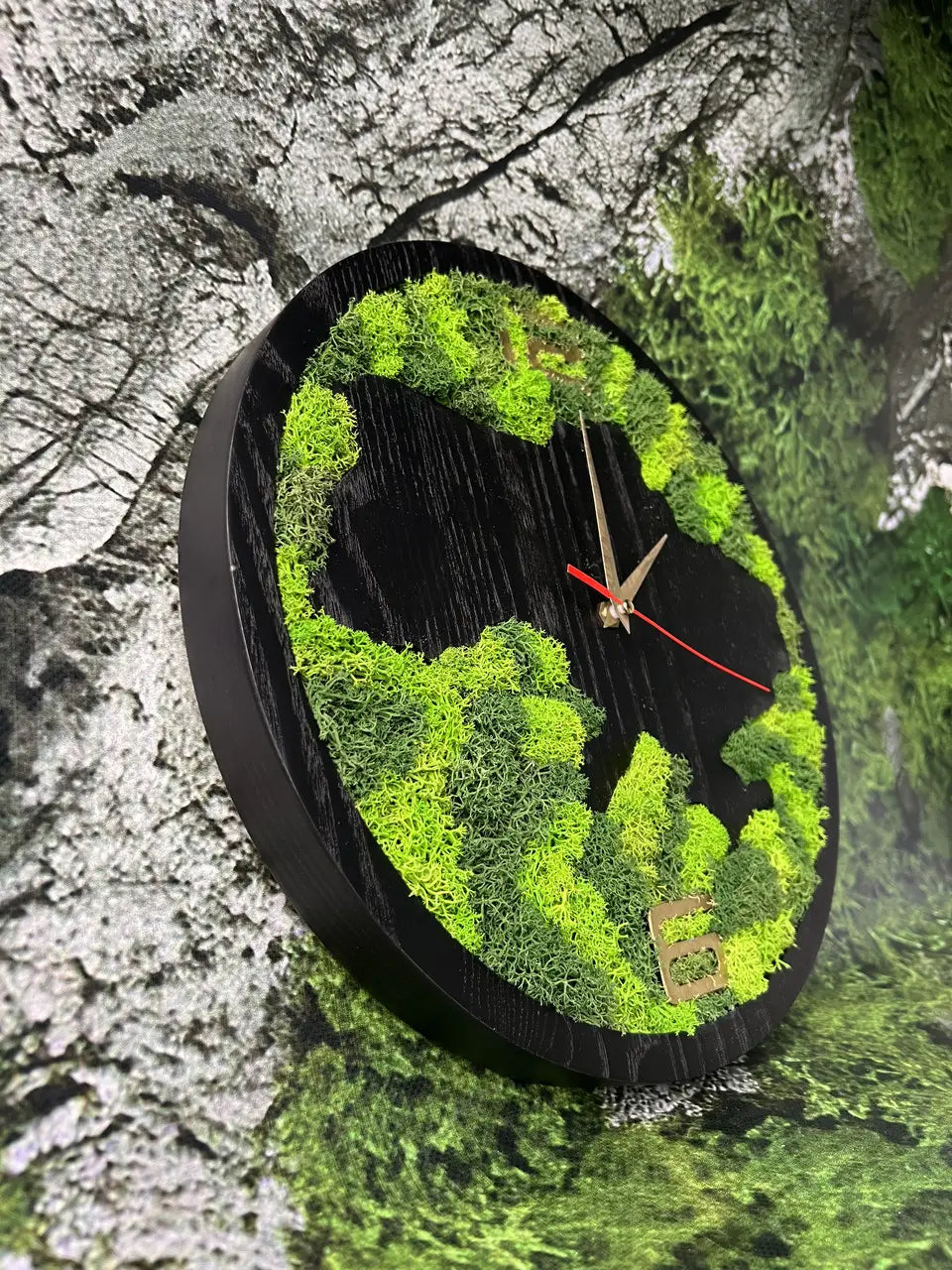 Dark ash wood clock with organic green moss pattern