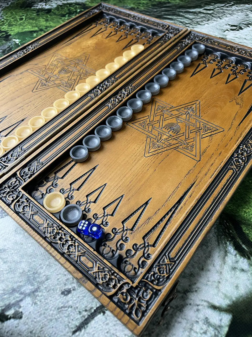 Hand-carved ash wood backgammon board with decorative geometric artwork