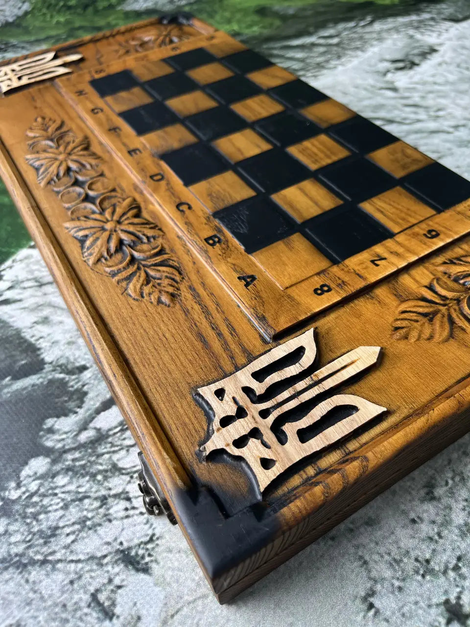 Ukrainian Tryzub carving on handcrafted wooden game board