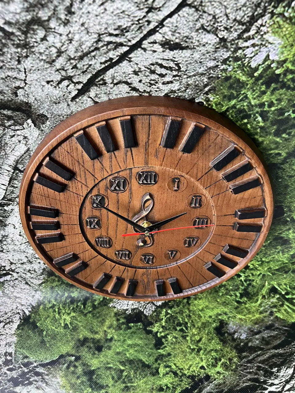 Close-up of piano wall clock dial with elegant clock hands