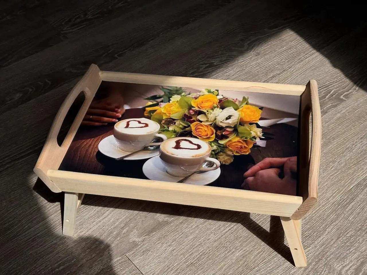 Wooden breakfast bed tray with floral design and foldable legs