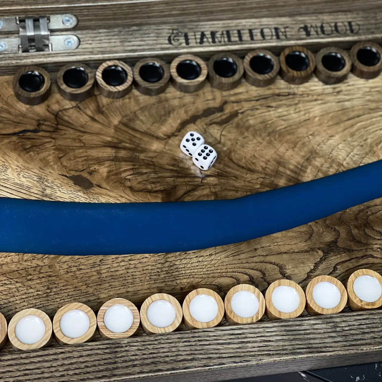 Handmade wooden backgammon board with vivid blue epoxy resin inlay