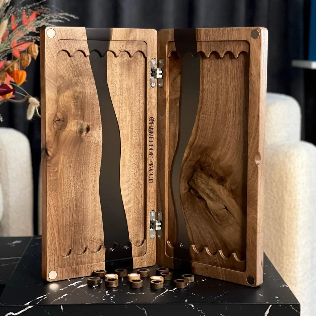 Black River backgammon set with wooden checkers displayed beside the open board
