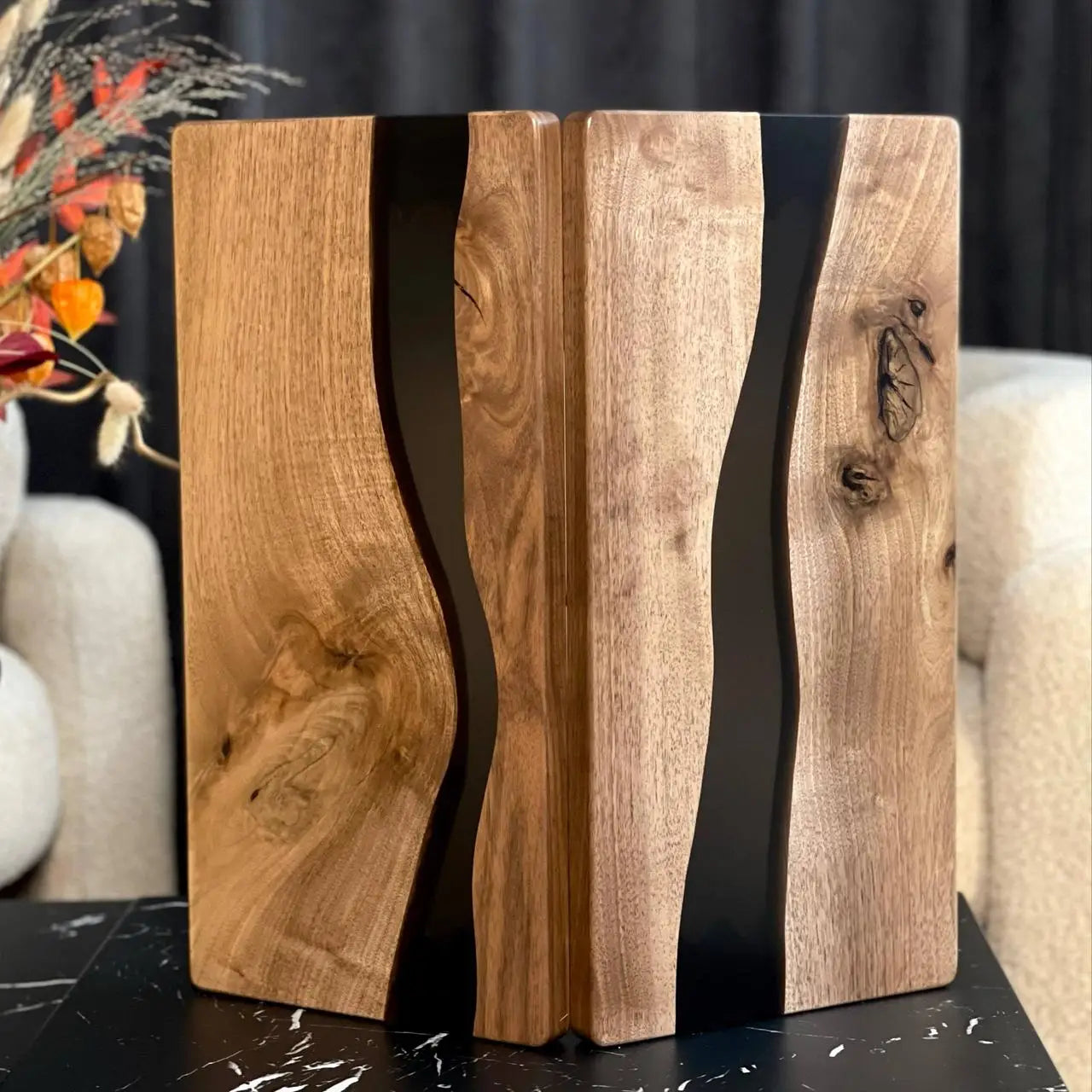 Handmade American walnut backgammon board with black epoxy resin during play
