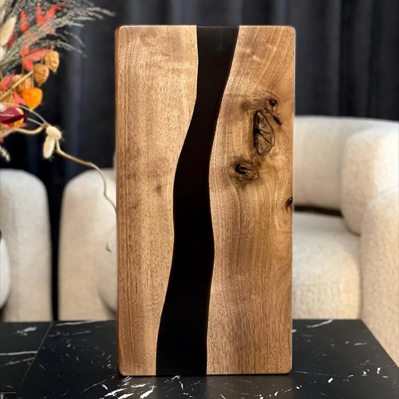 Closed handmade walnut backgammon board with black river-style epoxy design