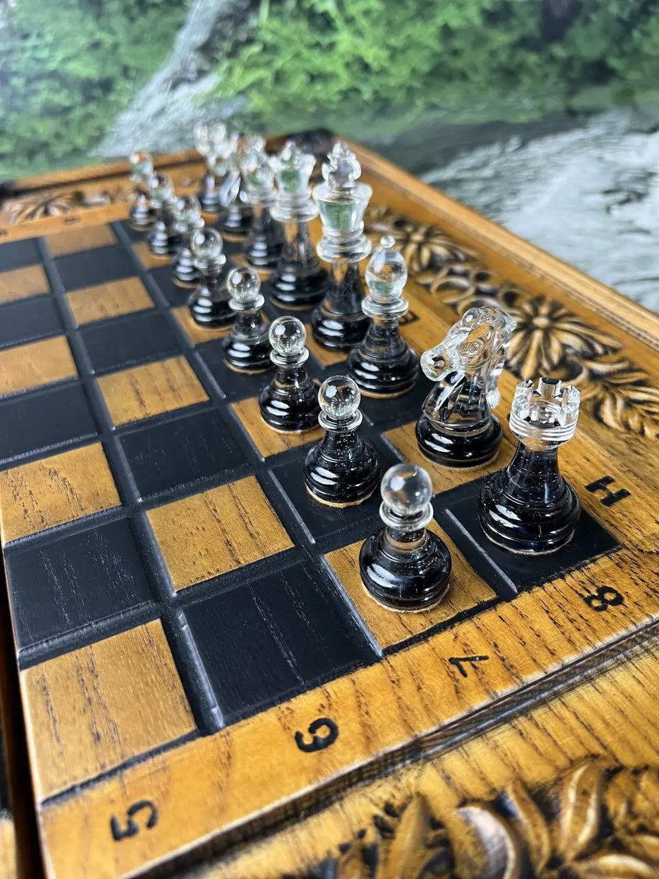 Black transparent epoxy resin chess pieces with crystal effect on chessboard
