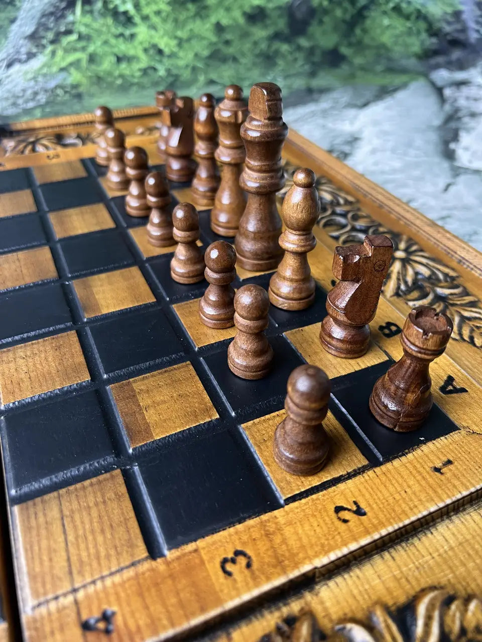 Classic brown wooden chess pieces arranged on premium chess board