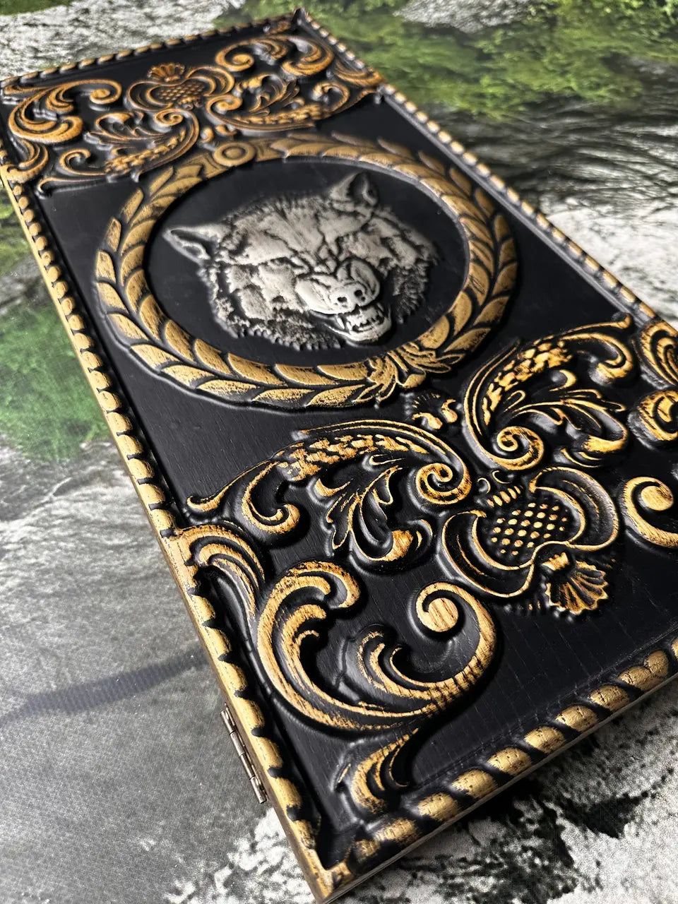 Detailed wolf carving on handcrafted wooden backgammon board