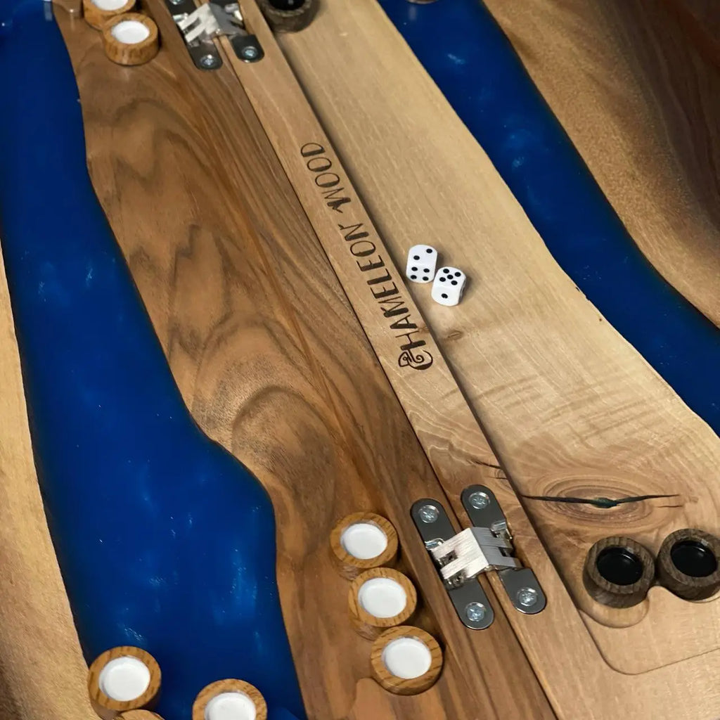 Close-up of Cobalt River backgammon board with wooden checkers, dice and blue resin