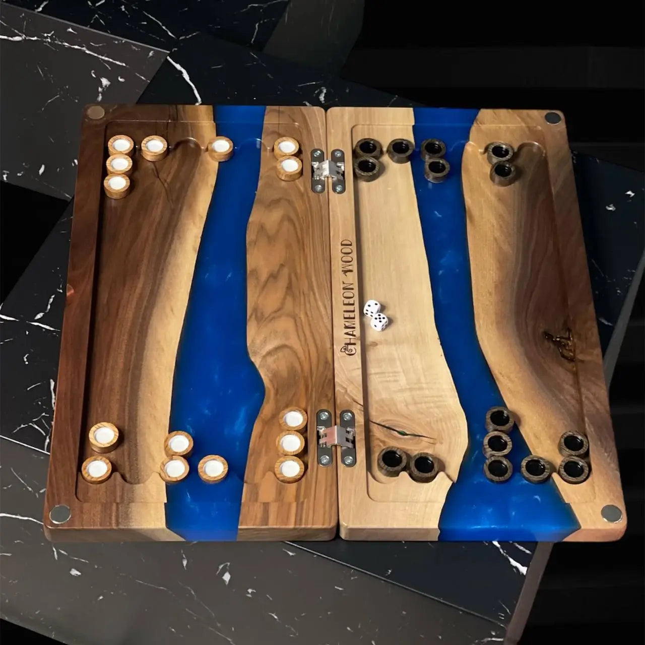 Cobalt River backgammon set during play with light and dark wooden checkers