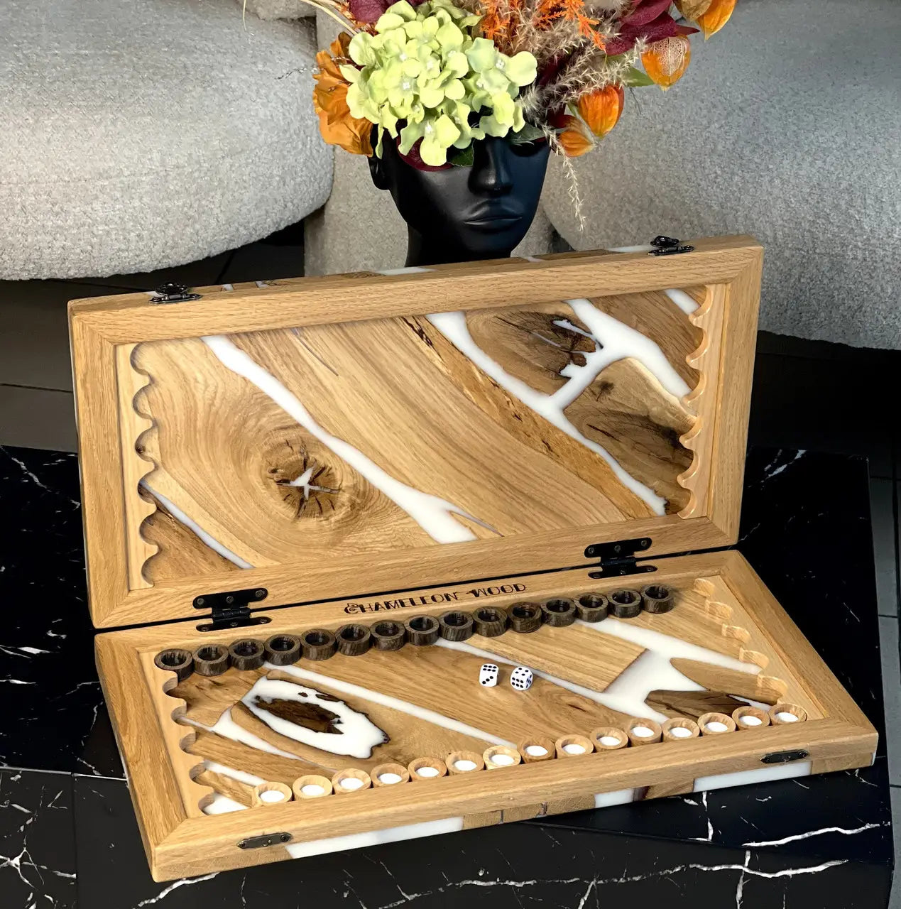 Closed Ivory River backgammon board with natural wood and flowing white epoxy resin