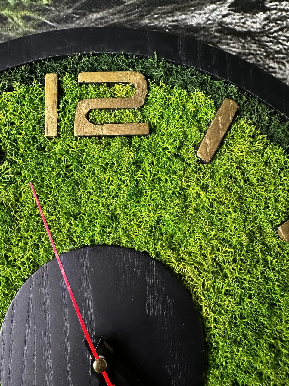 Natural wall clock with vibrant green stabilized moss