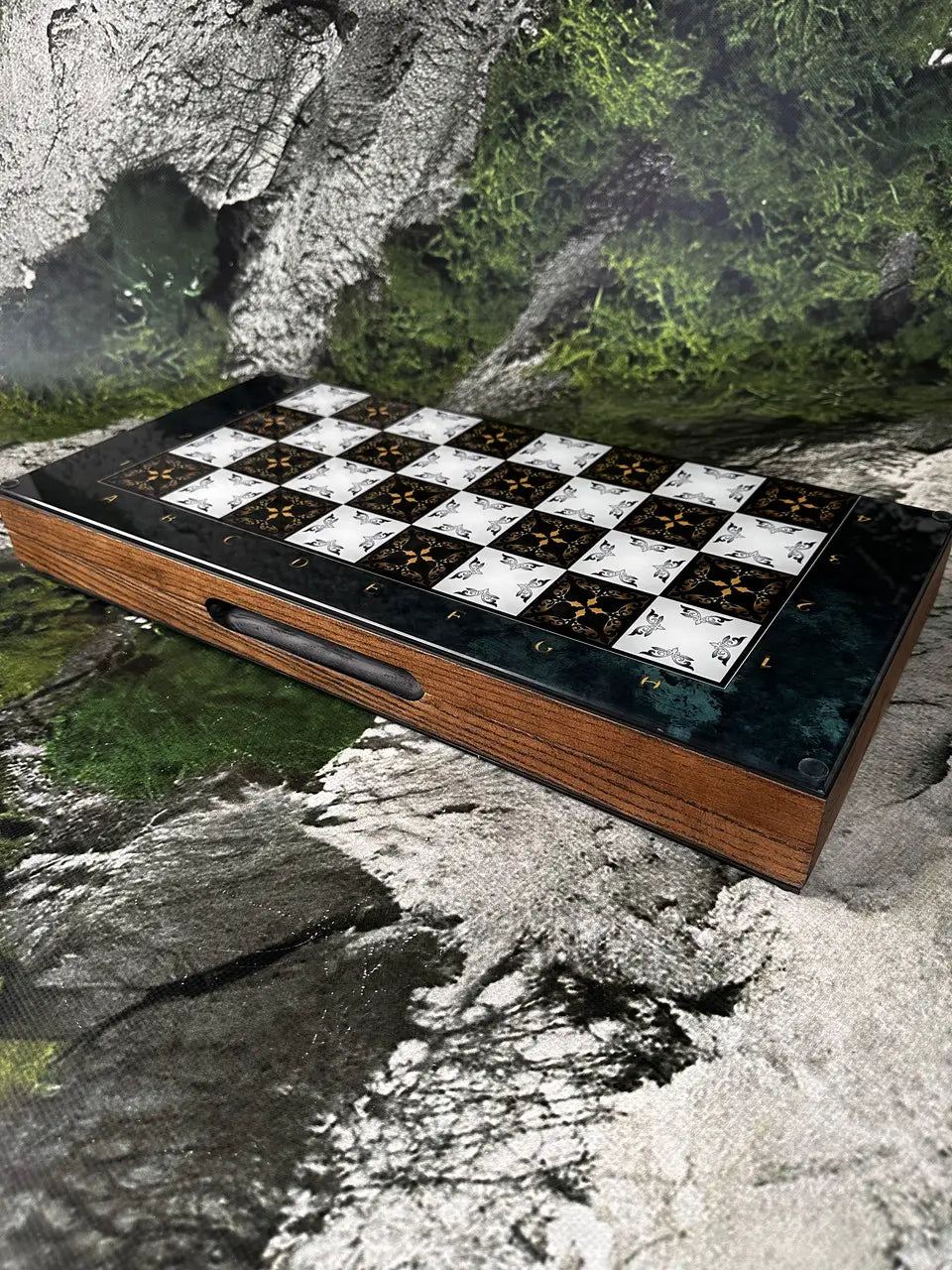 Close-up of tempered glass chessboard with decorative pattern