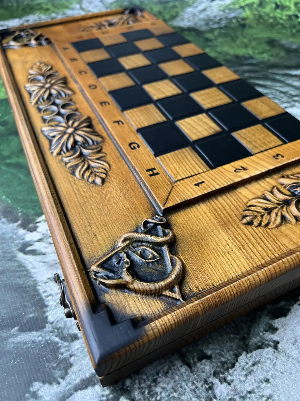 Open 3-in-1 wooden game board showing backgammon layout and carved details