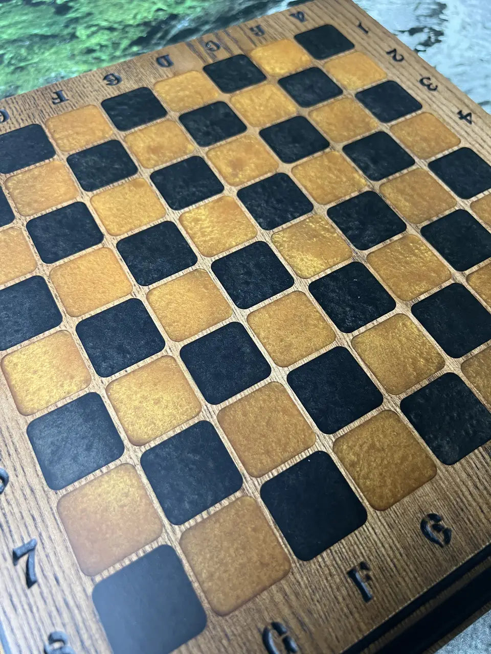 Decorative wooden chess set with resin pieces