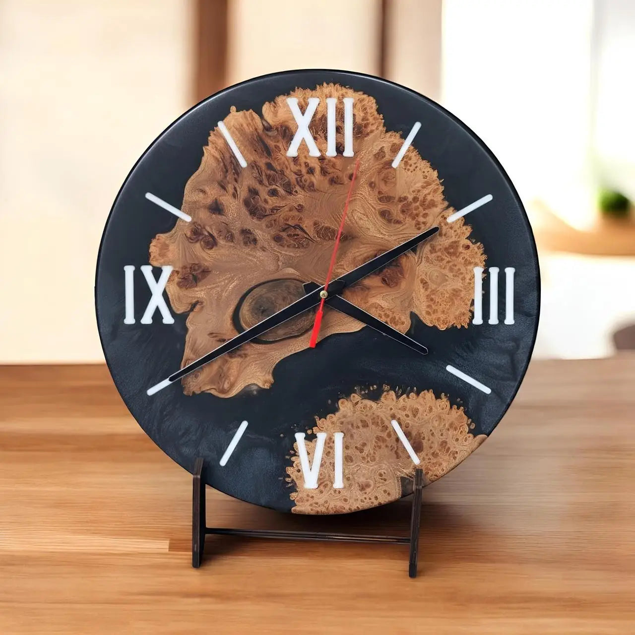 Handmade black epoxy resin wall clock with natural wood burl.