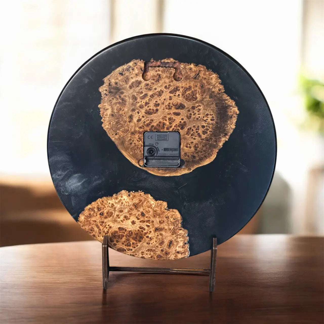 Modern handmade black epoxy wall clock for home décor.