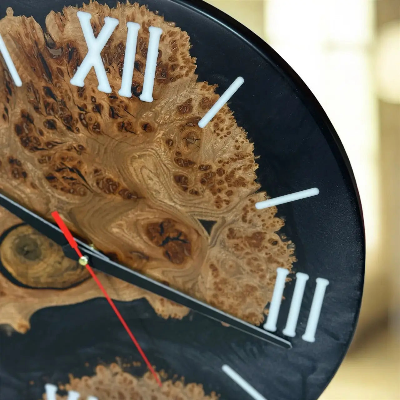 Luxury wooden wall clock featuring black epoxy resin and natural wood burl.