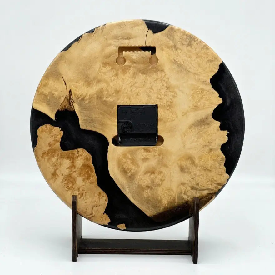 Silent quartz wall clock handcrafted from natural poplar burl and epoxy resin.