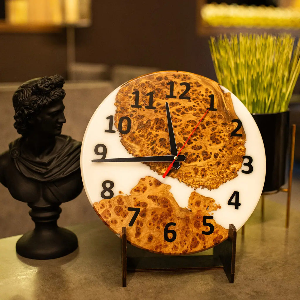Handmade epoxy resin wall clock crafted from natural elm burl.