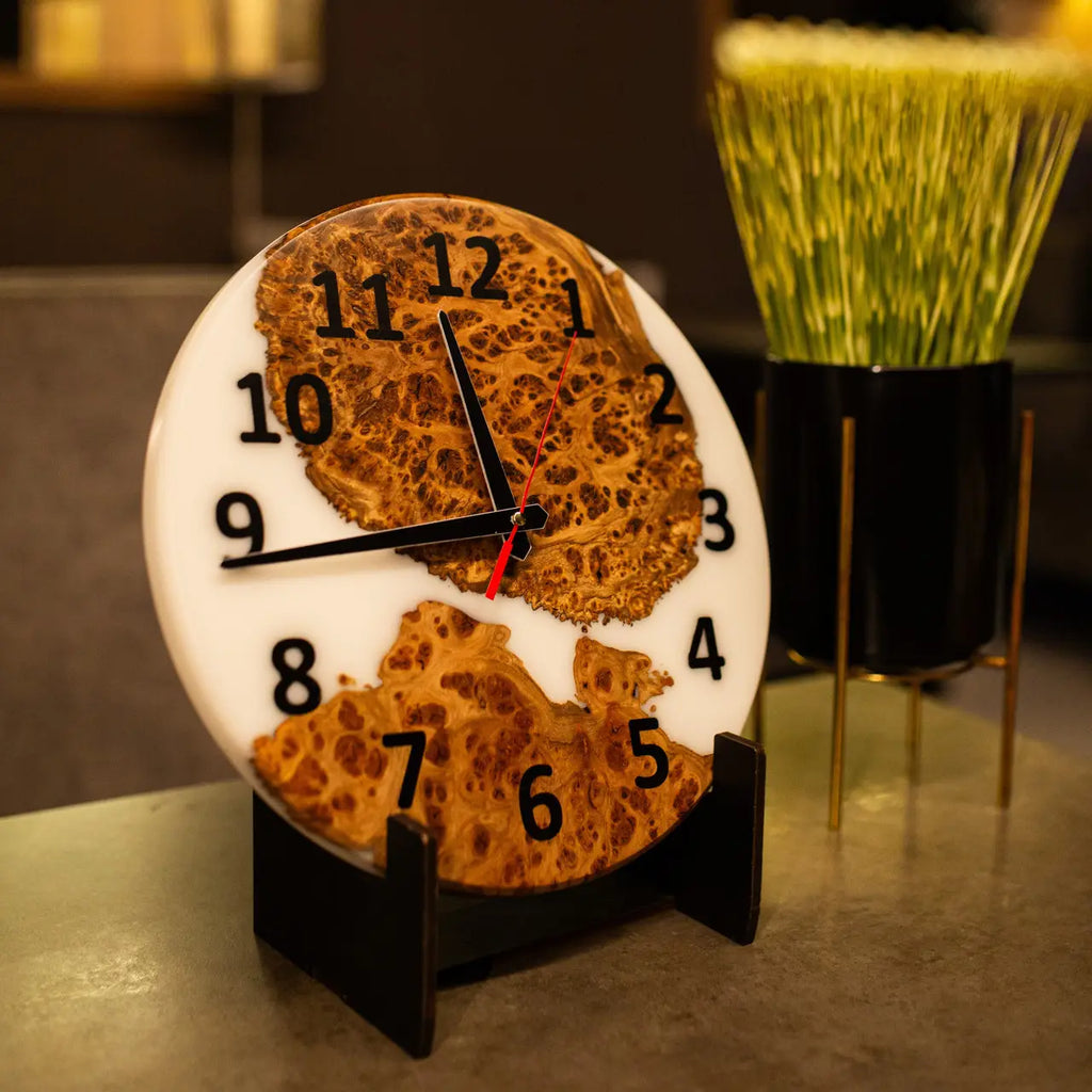 Luxury wooden wall clock with unique birch burl grain and epoxy resin.